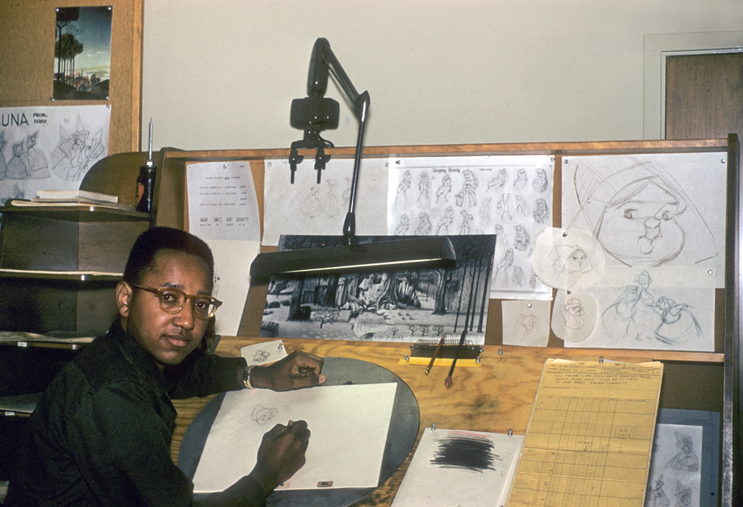 Floyd_Norman_at_the_board_apprentice_inbetweener_Sleeping_Beauty_1956
