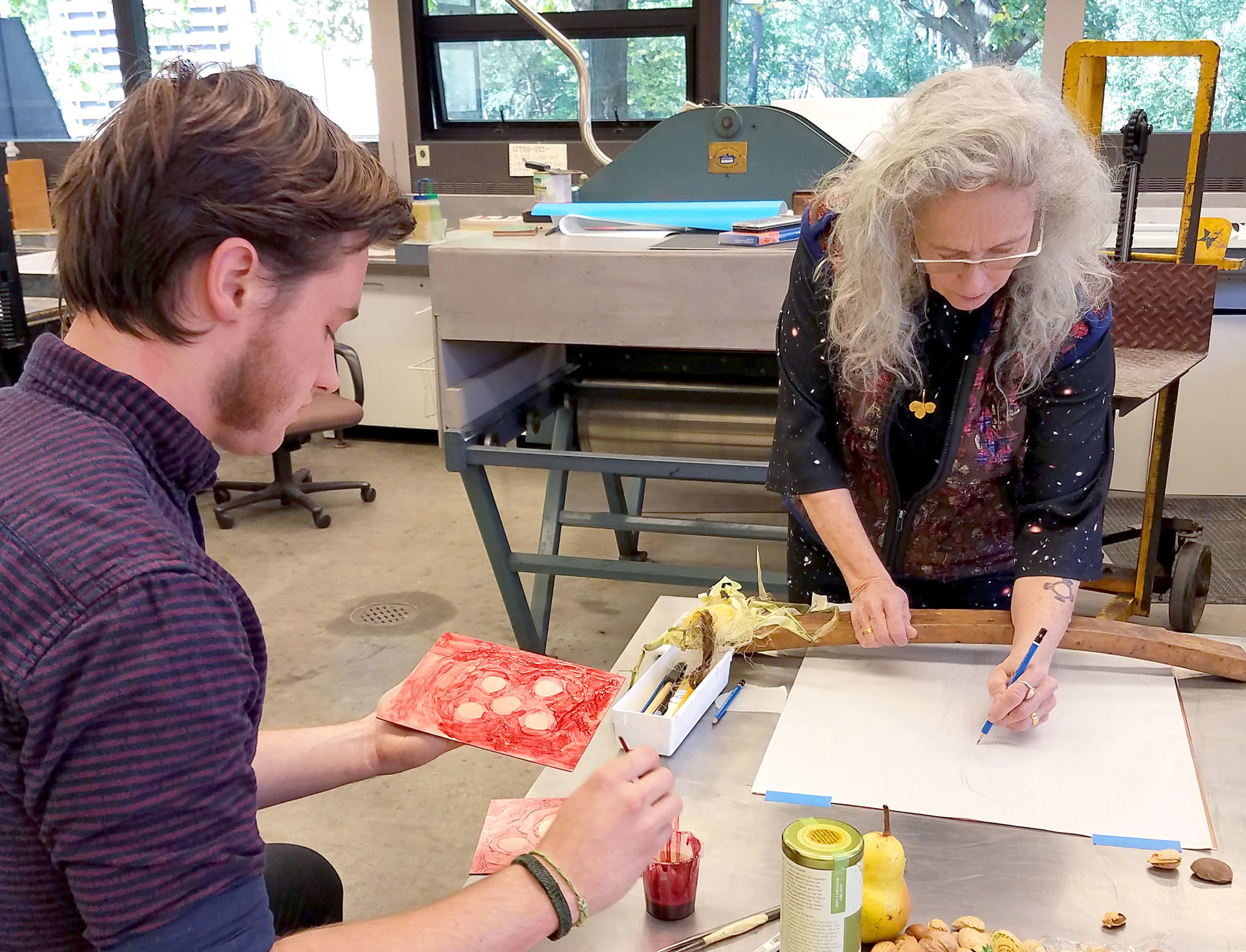 Nathan_assisting_Kiki_with_making_plates_for_Autumn_prints
